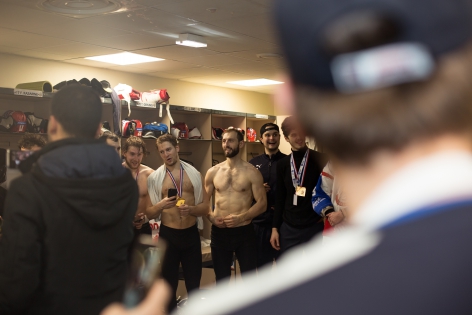  In the Lyon locker room, the team and staff are about to celebrate their victory. The Lyon Lions won the French Cup for the first time in their history. They faced the reigning French champions, the Rapaces of Gap, in the final. AccorHotels Arena. Paris, France - January 28, 2018.?Dans le vestiaire de Lyon, les joueurs et le staff s'appr