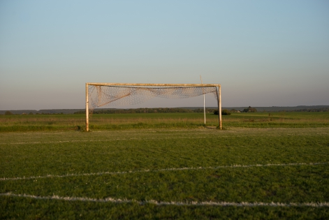  On the Narcy stadium lawn, built by the club's volunteer leaders. In Nievre, department where many communes and villages are affected by rural desertification, football remains an activity that maintains social ties. In Narcy, a village of 530 inhabitants, a small stadium welcomes more than seventy licensees throughout the year, from the youngest to the oldest. A real place to meet and learn where friends and families of FC Narcy players converge every weekend for a game in the countryside. Narcy, France - 22 april 2018.
Dans la Ni