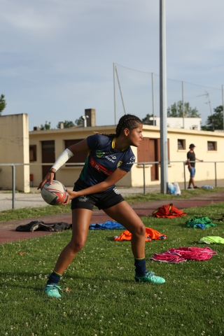  A player from Sao Paulo gets into a warm-up before a game. The trial from the other side of the world, is a sporting, social and solidarity project that brought together young rugbywomen from the Rugby Para Todos club from one of the largest Favelas in Sao-Paulo (Brazil) and the Olympique de Pantin in Seine-Saint-Denis (France) for a two-week tour on French rugby courts. Bordeaux, France. June 28, 2019.Une joueuse de Sao Paulo s'?chauffe avant de d?buter un match d'entra?nement. ?L'essai du bout du monde, est un projet sportif, social et solidaire qui a r?uni des jeunes rugbywomen du club de Rugby Para Todos issu de l'une des plus grandes Favelas de Sao-Paulo (Br?sil) et de l'Olympique de Pantin en Seine-Saint-Denis (France) pour une tourn?e des deux semaines sur les terrains fran?ais. Bordeaux, France. 28 juin, 2019.